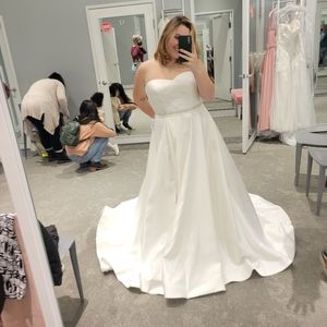 Size 14 never worn wedding dress